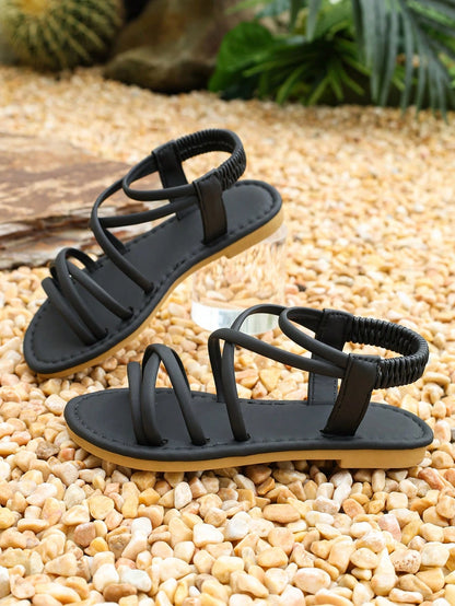 1 Pair Girls' Black Criss-Cross Strap Flat Sandals, Non-Slip Soft Sole Elastic Back Strap, Summer Casual Beach Children's Shoes