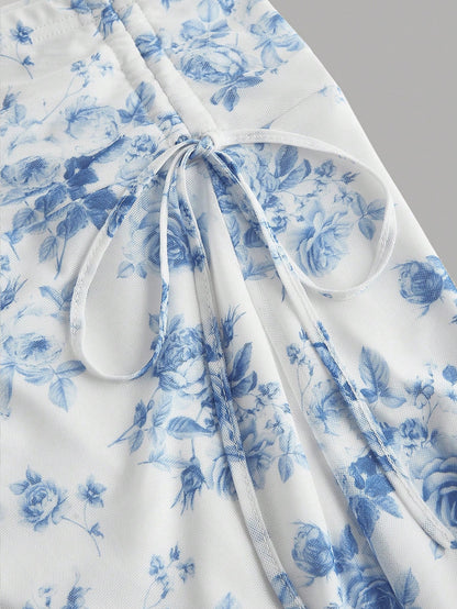 MOD Women's Ruched Waist Side Tie Asymmetrical Hem Blue & White Floral Print Skirt
