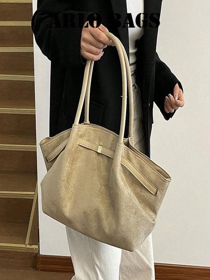 Stylish Suede Tote Bag With Contrasting PU Handles, Gold Square Metal Buckle, Soft And Spacious Design, Perfect For Everyday Commuting.