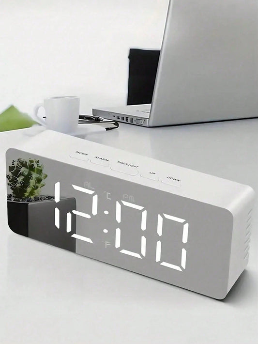 This Auto-Brightness Adjustable Alarm Clock Can Be Used Day And Night. The LED Digital Alarm Clock Features Dual Alarms, Temperature Display, Automatic Day/Night Brightness Adjustment, 12/24 Hour Form