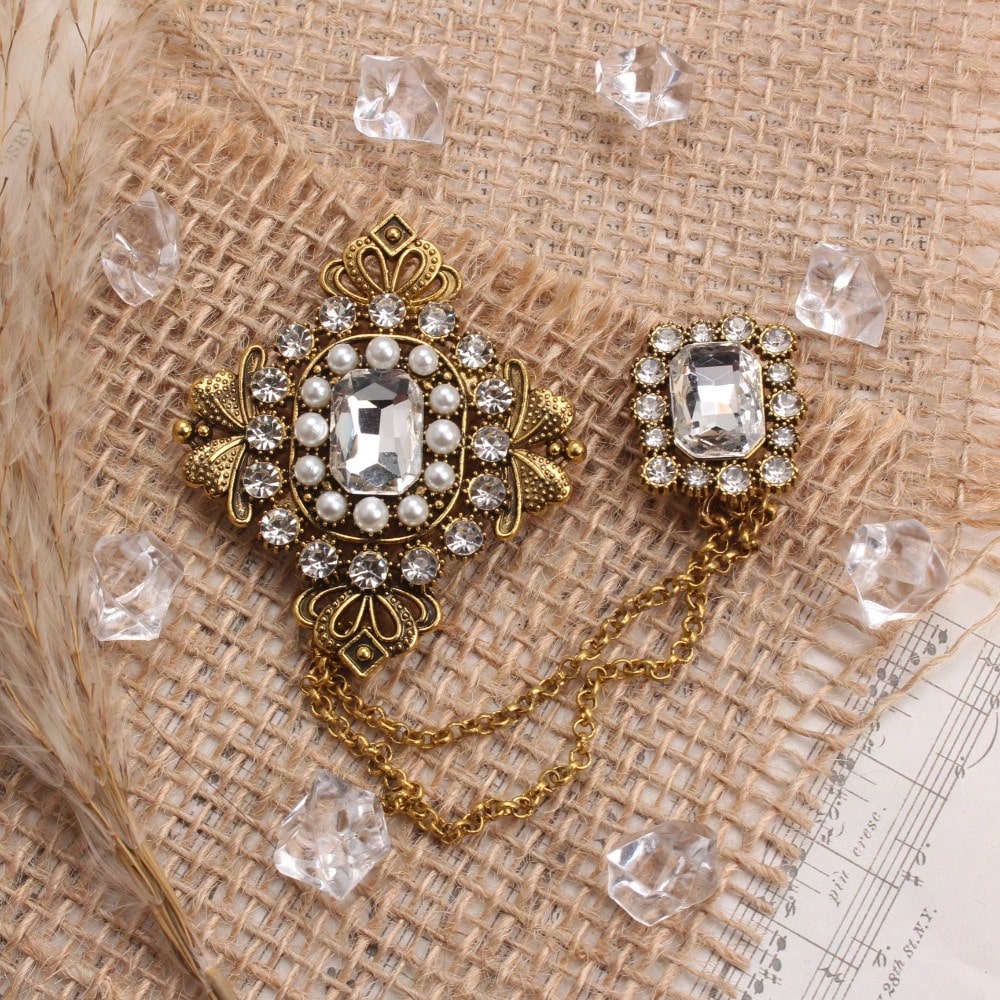 Vintage Ornate Brooch, Gold-Toned Craft With Pearl, Large Clear Crystal, Intricate Pattern & Chain-Attached Accent Detailing, Elegant Statement Accessory For Fashion Enthusiasts, Ideal For Outfits, Ba