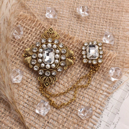 Vintage Ornate Brooch, Gold-Toned Craft With Pearl, Large Clear Crystal, Intricate Pattern & Chain-Attached Accent Detailing, Elegant Statement Accessory For Fashion Enthusiasts, Ideal For Outfits, Ba