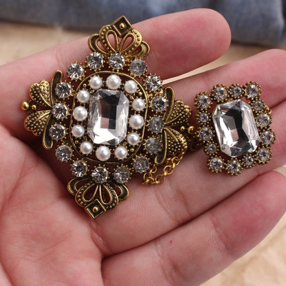 Vintage Ornate Brooch, Gold-Toned Craft With Pearl, Large Clear Crystal, Intricate Pattern & Chain-Attached Accent Detailing, Elegant Statement Accessory For Fashion Enthusiasts, Ideal For Outfits, Ba