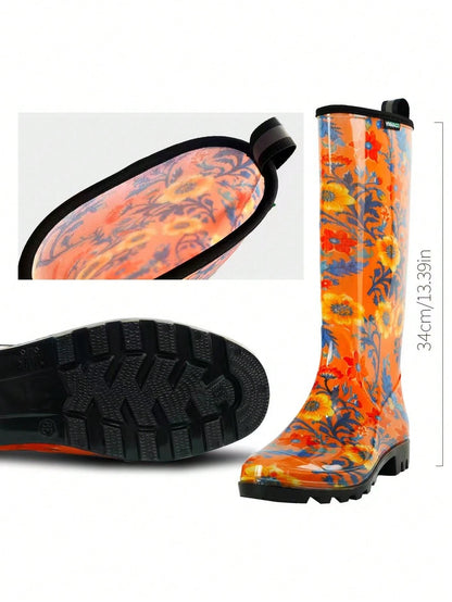Women's Orange Floral Print Tall Rain Boots, Waterproof Non Slip Lug Sole Garden Boots With Pull Tab